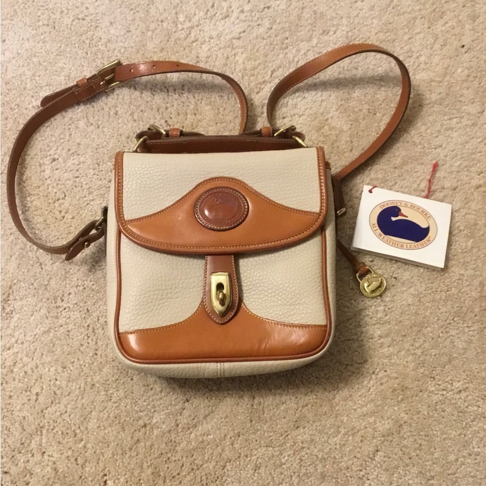 Dooney&Bourke all weather pebbled leather cross body bag like new condition